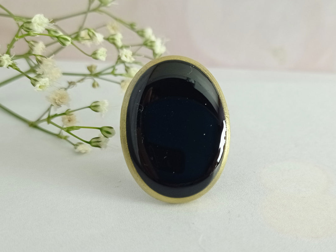 Glossy black ring