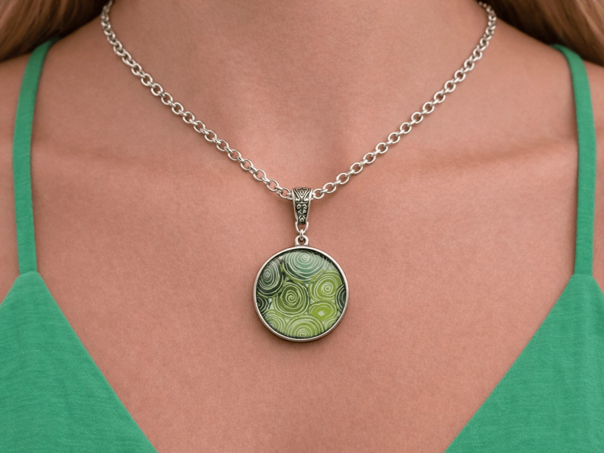 Samara green glass pendant necklace being worn by a model - Corky & Stoner Main image