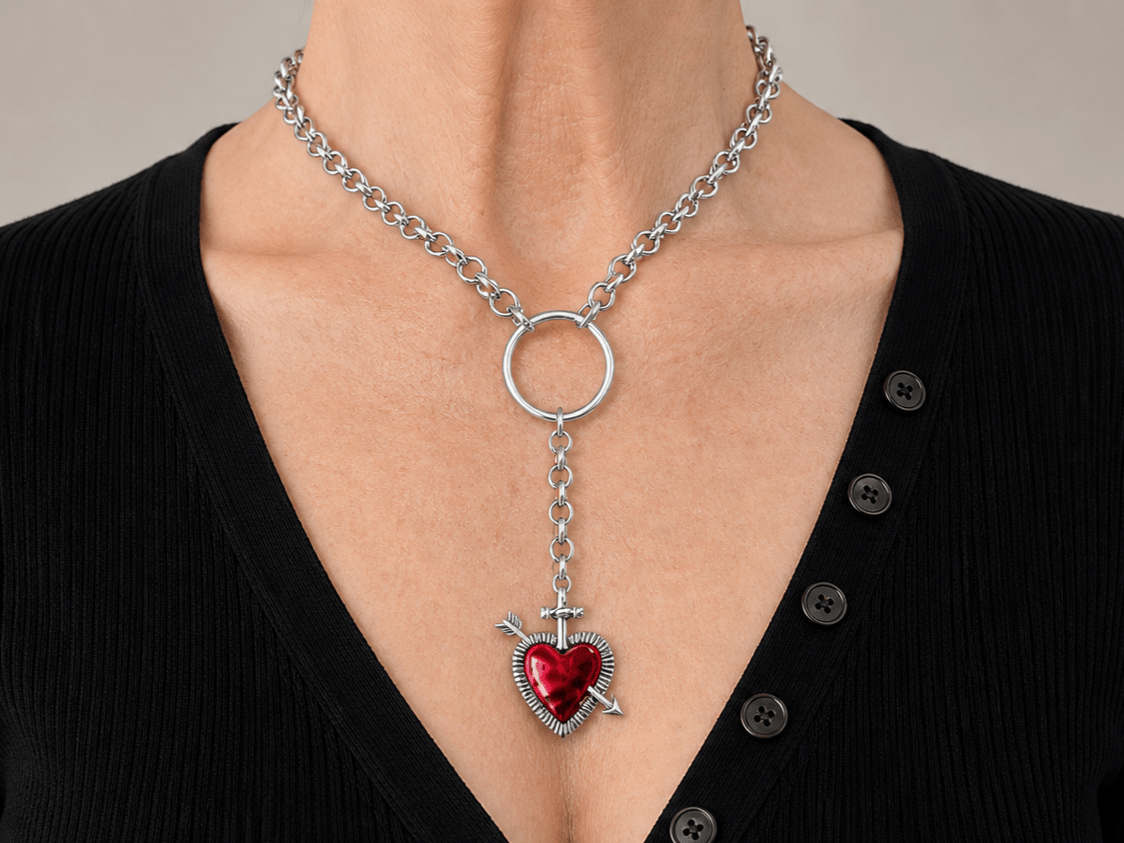 Red Heart Lariat Necklace with red heart charm being worn by a model in a black top Main image
