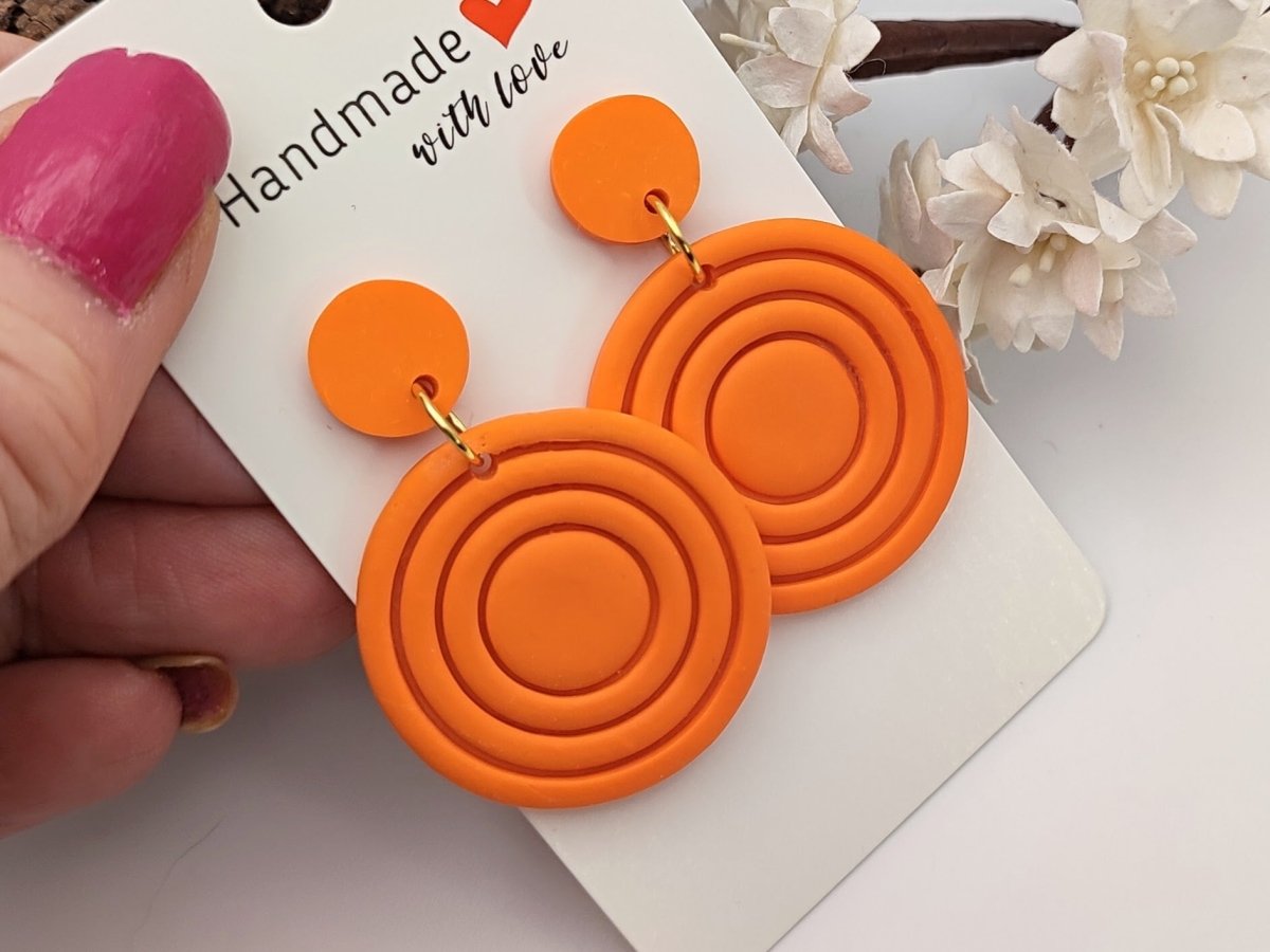 Sunbeam Large Orange Earrings Secondary image