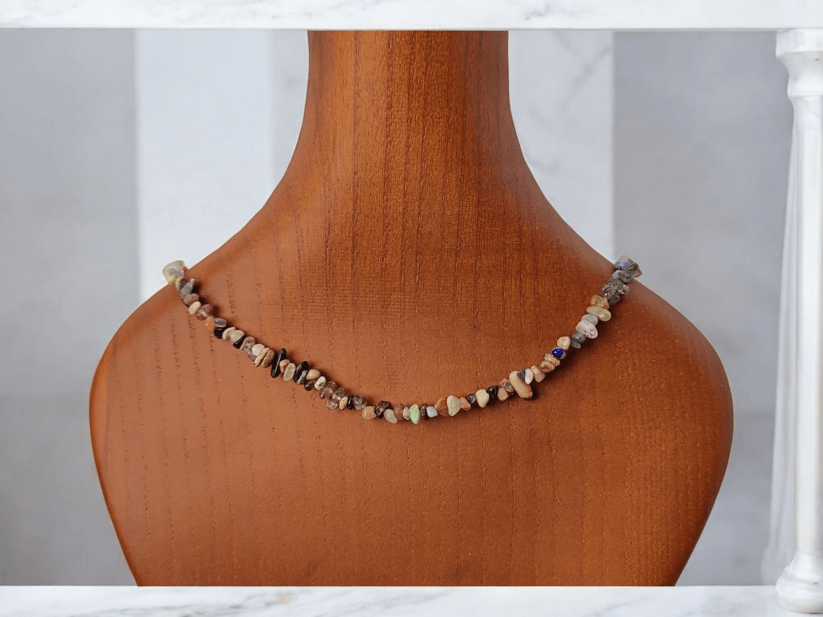 A multi stone beaded choker on a wooden bust Main image