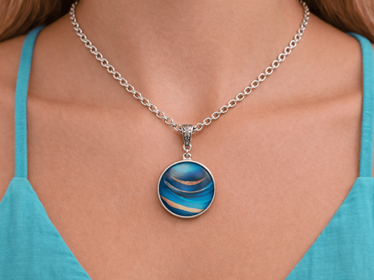 Novalee blue glass pendant necklace being worn by a model - Corky & Stoner Main image