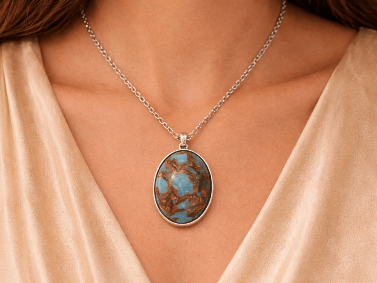 A model wearing a blue Jasper necklace