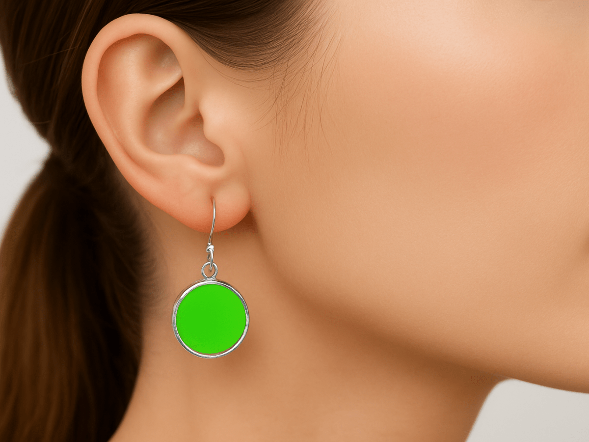 Neon green 925 silver drop earrings, 20mm round disc design. Hypoallergenic, lightweight, and handcrafted in the UK.- Corky & Stoner