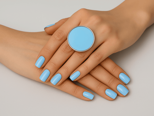 Aitana round pale blue statement ring worn on a models hand - Corky & Stoner