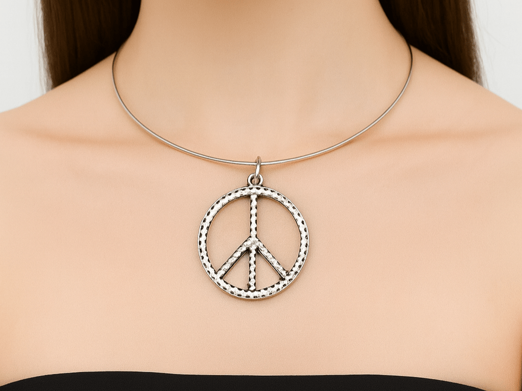 Peace sign pendant on a torque necklace