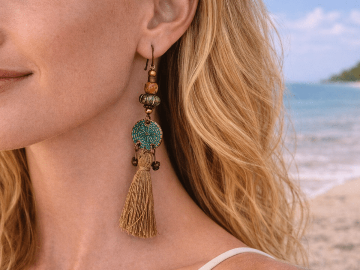 Emani long boho tassel earrings in bronze and turquoise being worn by a model - Corky & Stoner Main image