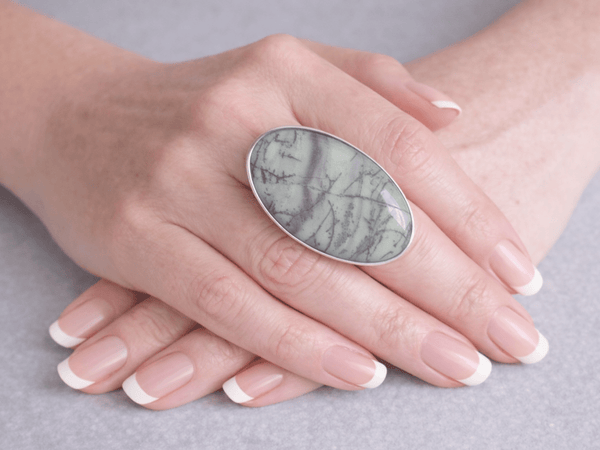 A bold wave jasper ring featuring soft grey and white tones with flowing, organic lines that create a natural, layered look - Corky & Stoner