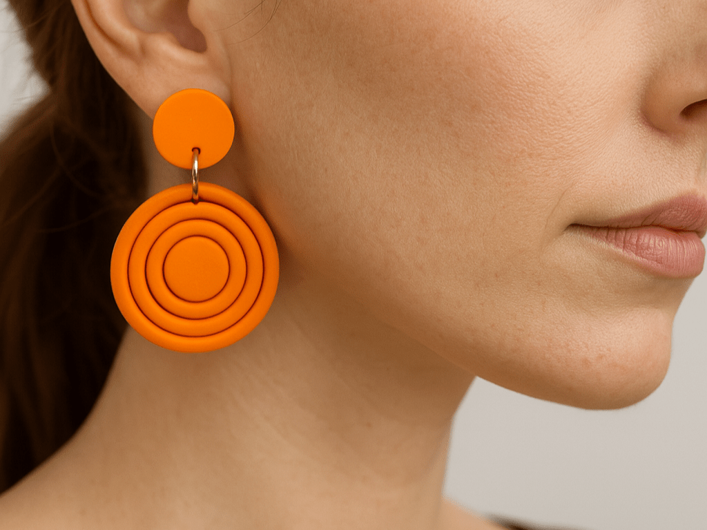 Vibrant, bright orange large round dangle fashion earrings. Crafted from lightweight polymer clay - Corky & Stoner