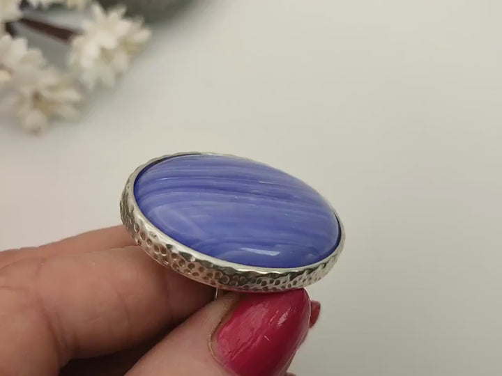 Adjustable ring with blue stone