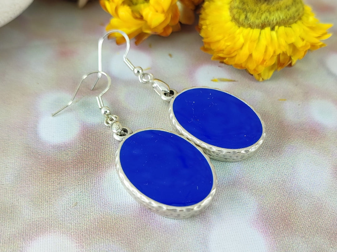 Bright blue oval silver dangle earrings in hammered antique silver, long blue oval dangle earrings, resin earrings